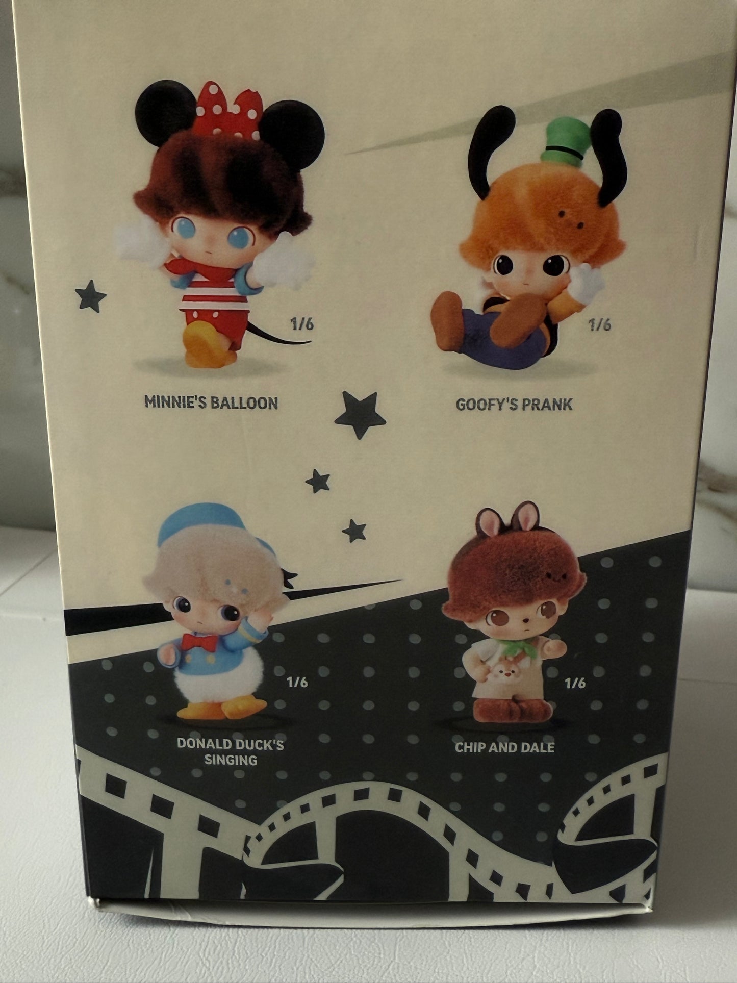 DIMOO WORLD – breloczek niespodzianka od PO MART x Disney!