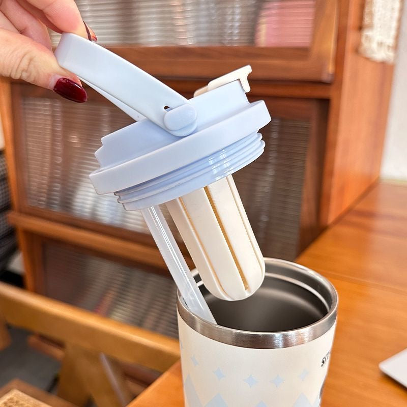 Kubek termiczny niebieski 560 ml z rączką stal nierdzewna utrzymuje ciepło